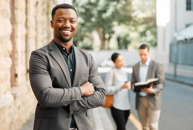 proud-my-career-shot-young-businessman-walking-work-with-his-colleagues_590464-64894